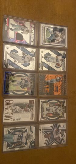 Cowboys football cards with Micah patch