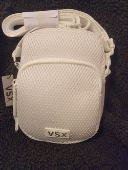 White Victoria's Secret VSX Phone Sling Crossbody Bag with a sporty mesh exterior and the signature VSX rubber logo patch