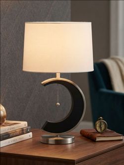 Upgrade your space today! Stunning
modern designer table lamp. Like new!