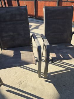 4 metal skywell chairs 200 stack them up