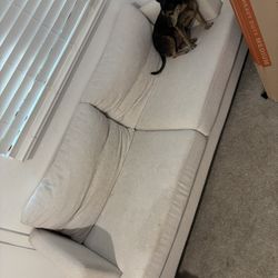 Small 70 Inch Long Ivory Couch 