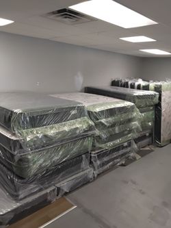 New Mattresses in Plastic Wrap
