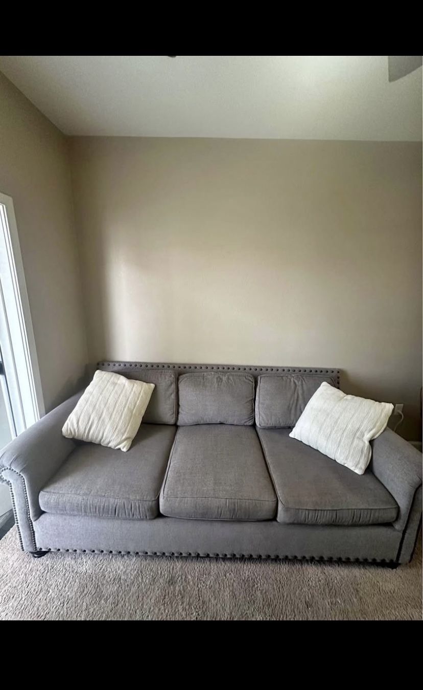 Gray Couch & Black Ottoman