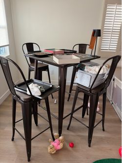 Bar height outdoor table with 4 cafe chairs