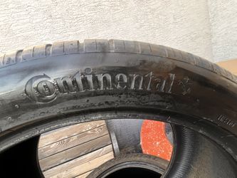 Set of 4 used matching 275/40/22  continental tires 