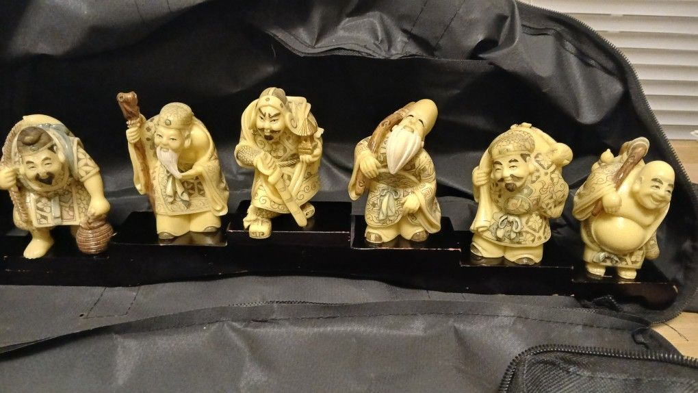This is a set of six carved figures depicting 6 Of The 7 Japanese Seven Gods of Fortune