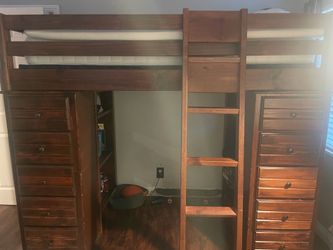 Expresso wood bunk bed with built in drawers.