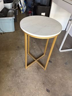 Gold and marble white table
