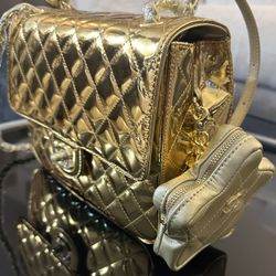 Gold Quilted CC backpack 23cm gold patent calfskin gold hardware with mini pouch