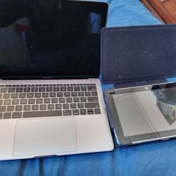 MacBook Pro Laptop And HP Tablet. 
