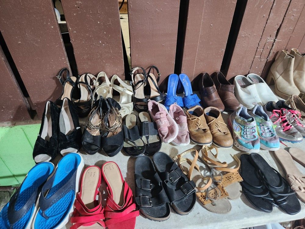 Different Variety Of Shoes Boots Sandals Working Boots