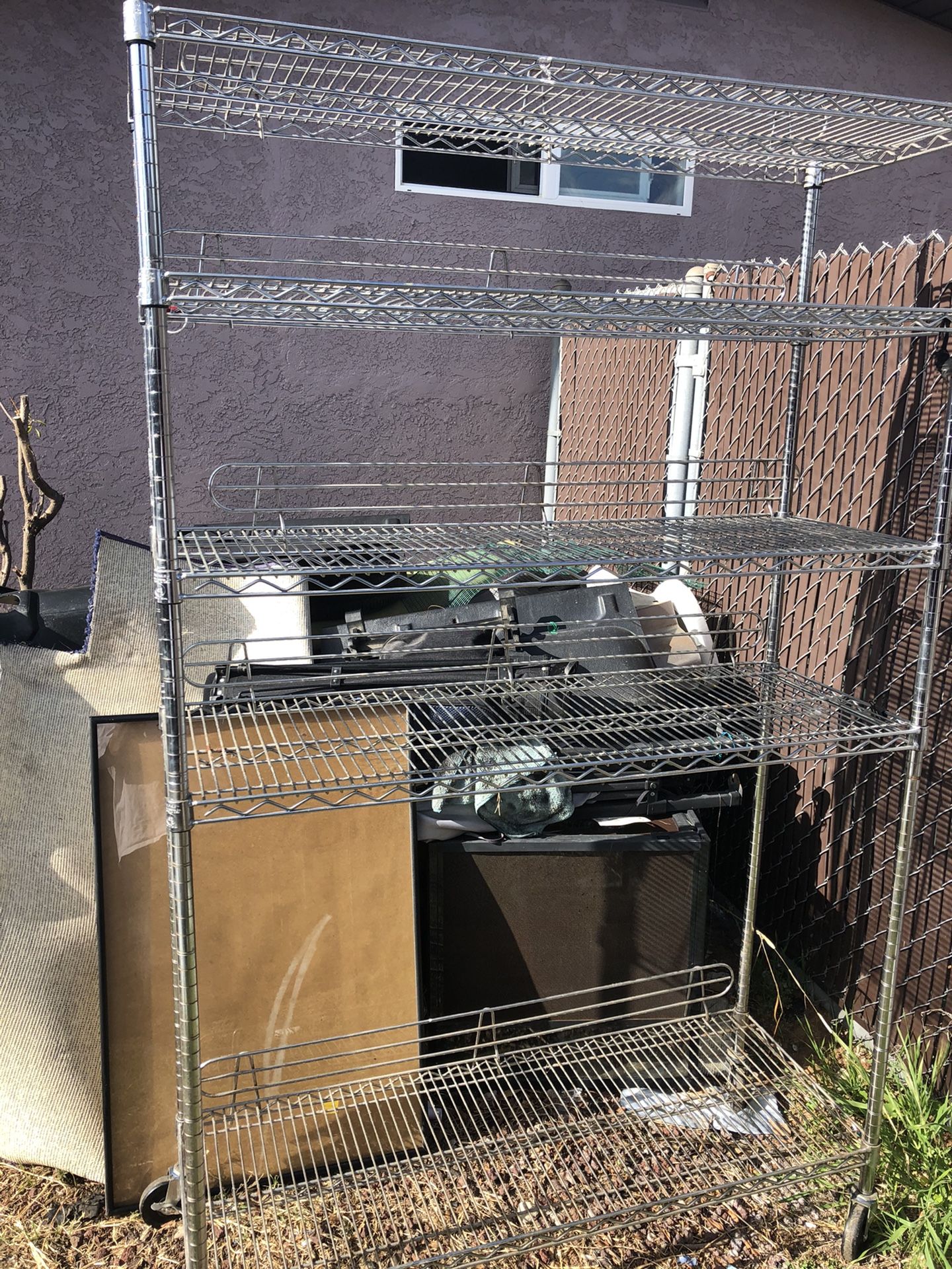 Five tier rolling storage rack excellent condition with wheels $100 or best offer