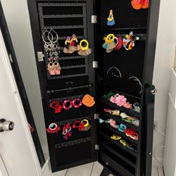 Jewelry cabinet (Comes with a mirror)