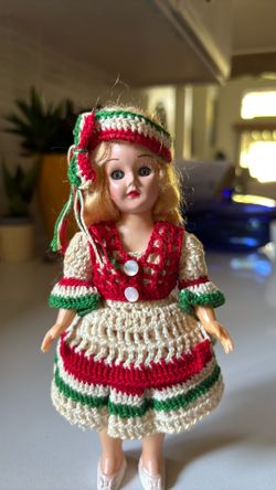 Vintage doll in beautifully crocheted dress