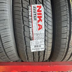 NEW TIRE 215-50-R17