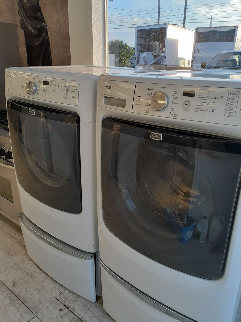 Maytag Washer and Dryer Set on Pedestal