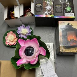 2 Solar Wind Chimes, 1 Lamp, 4 New Solar Floating Pond Lotus & 4 Used Ones