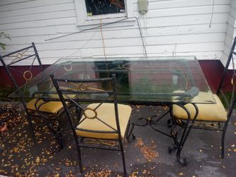 Metal and glass dining table