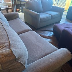Gray couch and loveseat good condition clean we sell all the time delivery extra 40 local