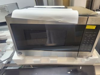 0.7 cu. ft. 700-Watt Spacemaker Countertop Microwave in Stainless Steel