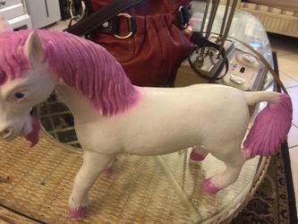 Rubber unicorn white and purple horse. In good condition, check all my listing.