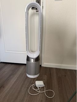 Dyson AM07 Cool Tower Fan  Works perfectly. No remote, but fan turns on/off with the button on the unit. Replacement remotes are easy to find online. 