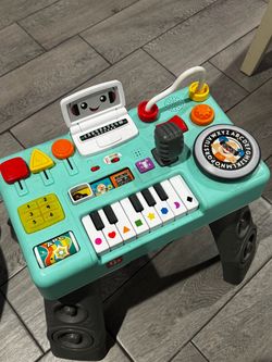 Fisher-Price Laugh & Learn Mix & Learn DJ Table Musical Toy, 100+ Learning Songs & Phrases, 12 Activities, Fine & Gross Motor Skills, Baby & Toddler A