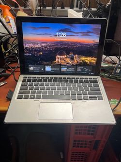 HP elite x2 1012 G2 laptop  I7-7600 @ 2.80 GHZ 8GB RAM  256GB SSD Windows 11 pro. It has a small crack in the back. See pictures for more details. Don