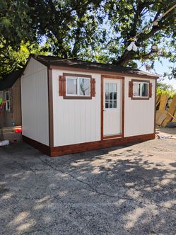 10 x 16  included 1 house door ,2 windows and paint
