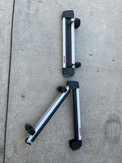 Yakima ski/snowboard attachment for bars