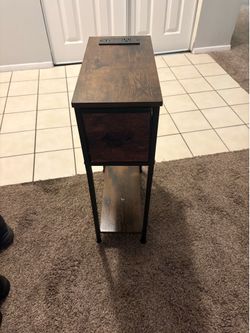 Thin nightstand with charging