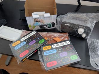 miscellaneous things keycaps, golf clubs, bluetooth speaker