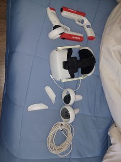 Meta Quest 2 VR Headset with Controllers and CYBVR Gun Attachments