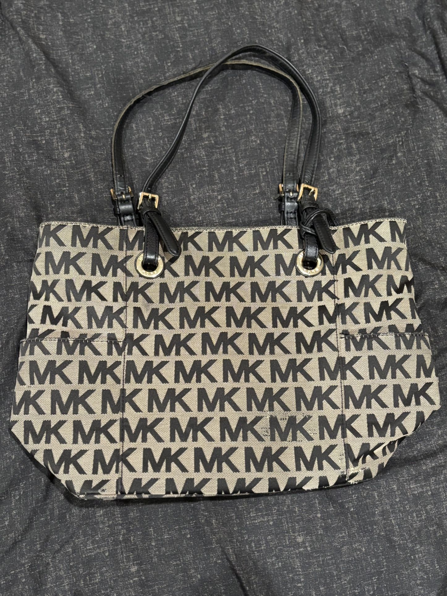 Michael Kors signature logo canvas tote bag with black leather straps