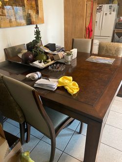 Large dining table with eight chairs