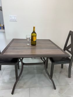 Anmutig Outdoor Dining Table with Square Wooden-Like PVC Table Top and Umbrella Hole for Bistro, Garden, Poolside, Backyard -Laminated Top Black Metal