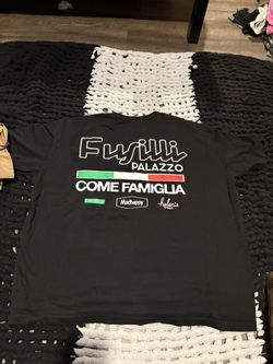 This is a Madhappy x Jon & Vinny's Vintage Black Tee with "Fusilli Palazzo"