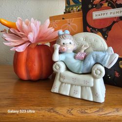 Ceramic Girl on Armchair Figurine