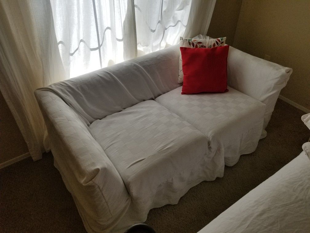 Two cushion couch fold out bed