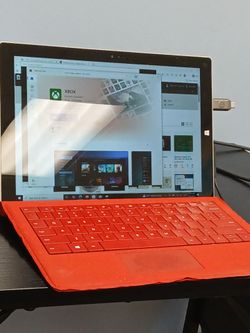 Microsoft Surface Pro with Red Type Cover all most trash time