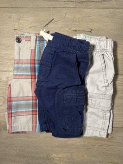Set of 3 boys shorts size 4 One new Arizona beans plaid shorts 2 used Carters cargo shorts