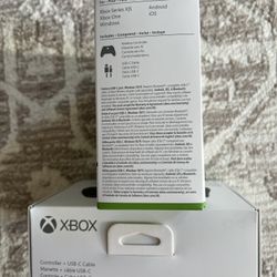 Factory sealed Microsoft Xbox wireless controller with charging cable
