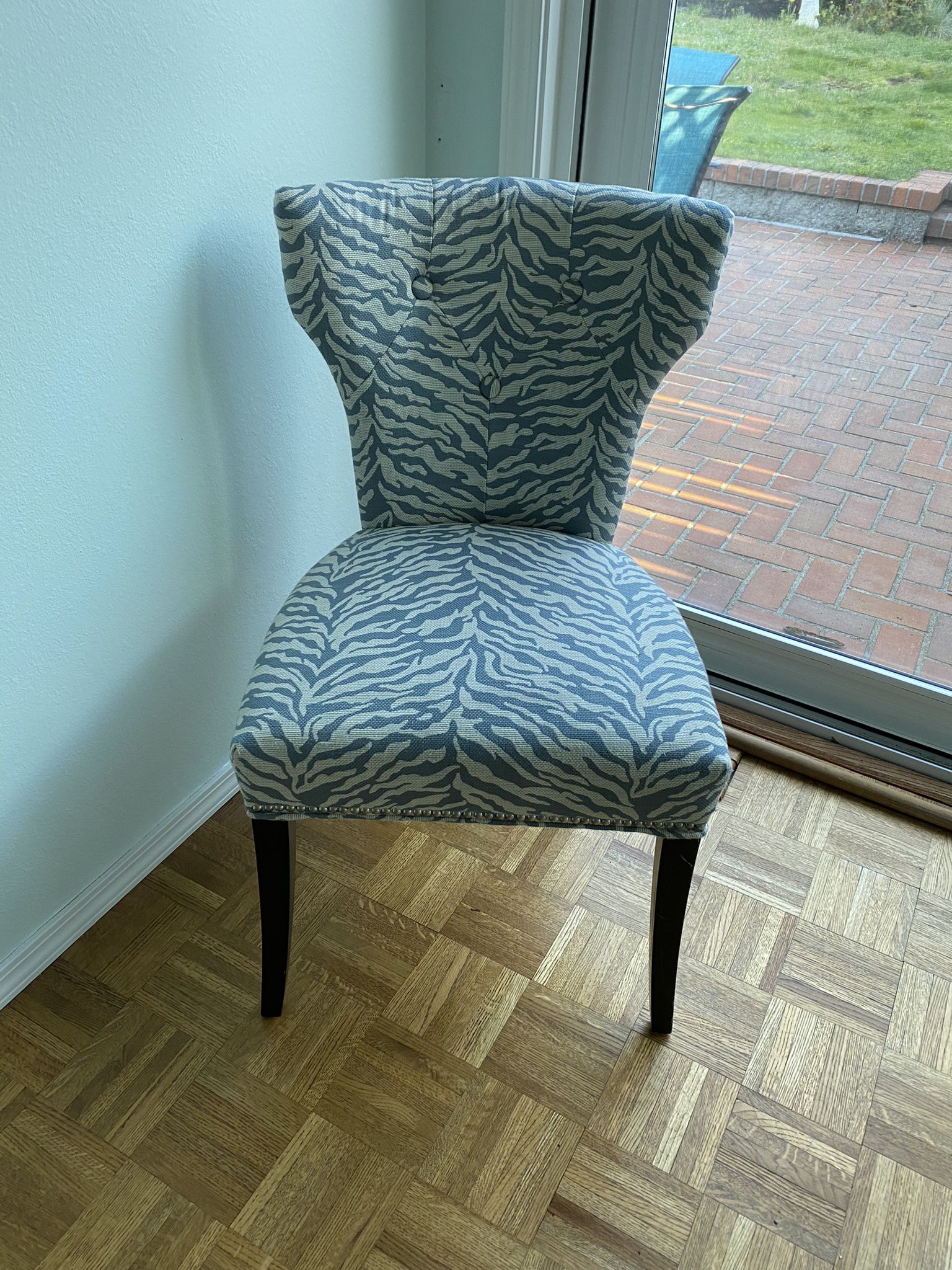 Grey and white animal print accent chair