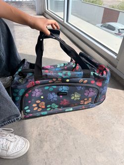 Colorful paw print suitcase