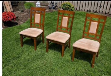 3 solid wood dining chairs in great condition.