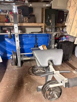 **Free delivery** Home gym bench + weights & extras