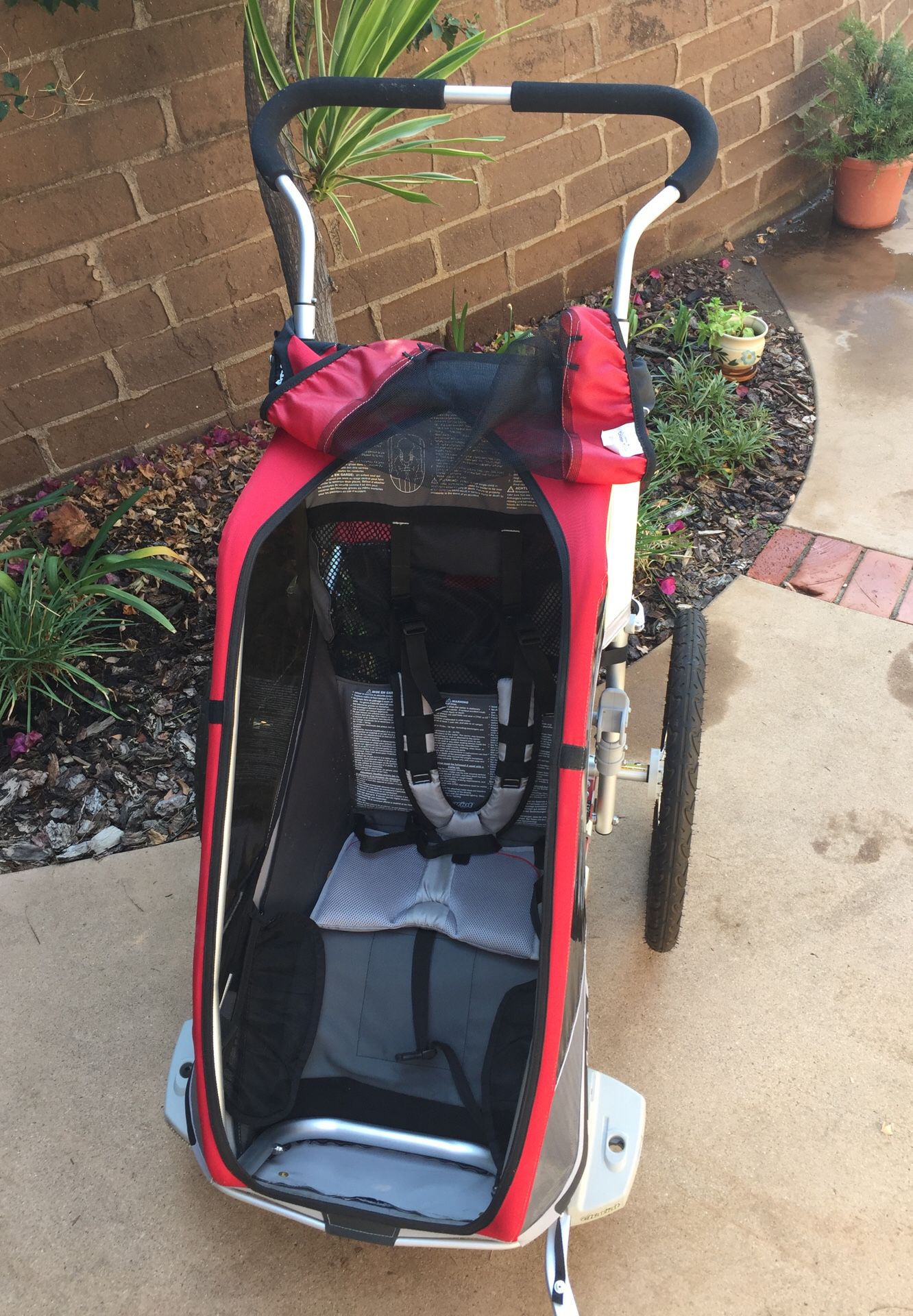 Child’s bike trailer by Thule . The Best !