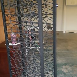 Metal 77 wine bottle rack in great condition $75 firm!!!!  Puo