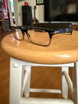 Persol eyeglasses price firm