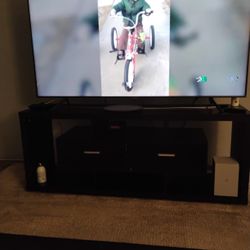 65 Inch TV and Stand